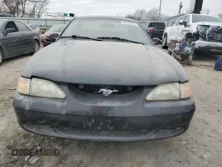 1997 Ford Mustang with VIN 1FALP4042VF198111, listed as a Copart auction lot 44245505 with 99,501 mi miles and Salvage Title. Bid and sale history available at carsss.com. Image 5.