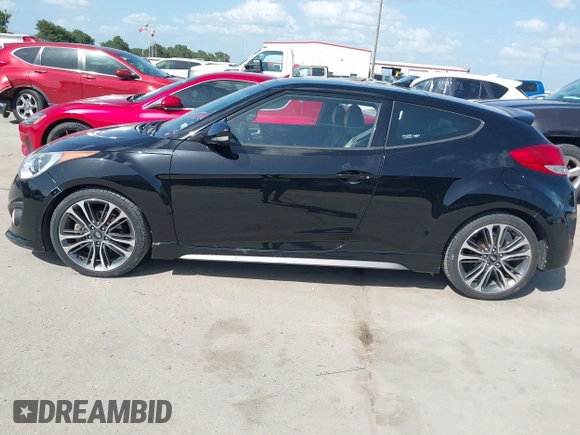 2016 Hyundai Veloster Turbo z VIN KMHTC6AE7GU255020, wystawiony jako IAAI lot #42720287 z przebiegiem 89 629 mil mil oraz . Historia ofert i sprzedaży dostępna na DreamBid. Obrazek 15.