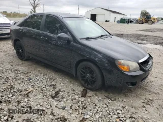 2009 Kia Spectra EX with VIN KNAFE221395026165, listed as a Copart auction lot 73715994 with 245,813 mi miles and Salvage Title. Bid and sale history available at carsss.com. Image 4.