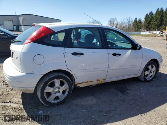 2004 Ford Focus with VIN 3FAFP37Z74R121213, listed as a Copart auction lot 53339645 with 65,590 mi miles and Clean title. Bid and sale history available at DreamBid. Image 3.