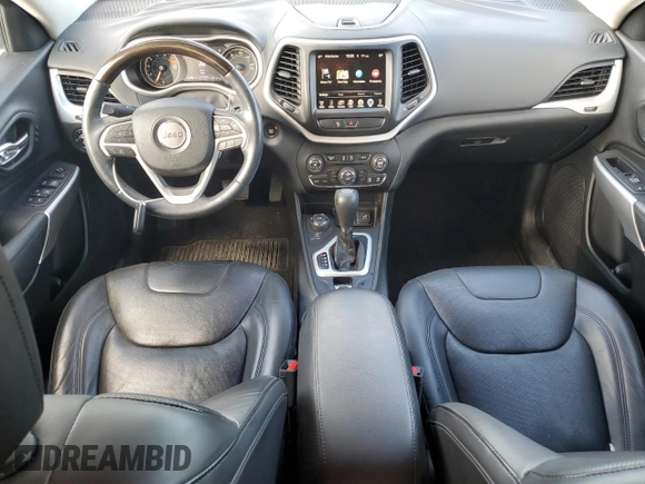 2018 Jeep Cherokee Overland with VIN 1C4PJMJX0JD594467, listed as a Copart auction lot 73963684 with 101,589 mi miles and Salvage Title. Bid and sale history available at carsss.com. Image 8.