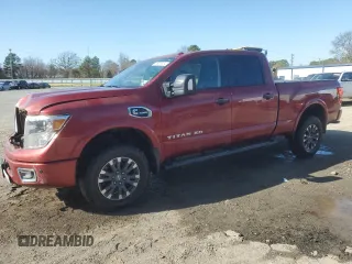 2017 Nissan Titan XD SL with VIN 1N6BA1F47HN563998, listed as a Copart auction lot 86925654 with 107,640 mi miles and Salvage Title. Bid and sale history available at carsss.com. Image 1.