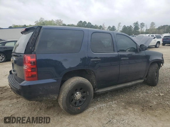 2014 Chevrolet Tahoe Commercial with VIN 1GNLC2E08ER209599, listed as a Copart auction lot 51018165 with 111,585 mi miles and Salvage title. Bid and sale history available at DreamBid. Image 3.
