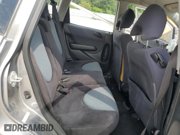 2007 Honda Fit Sport z VIN JHMGD38657S035465, wystawiony jako Copart lot #57635245 z przebiegiem 184 627 mil mil oraz Szkoda całkowita • Salvage title. Historia ofert i sprzedaży dostępna na DreamBid. Obrazek 10.
