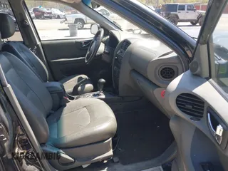 2002 Hyundai Santa Fe GLS z VIN KM8SC73D42U281993, wystawiony jako IAAI lot #42098783 z przebiegiem 256 094 mil mil oraz . Historia ofert i sprzedaży dostępna na DreamBid. Obrazek 5.