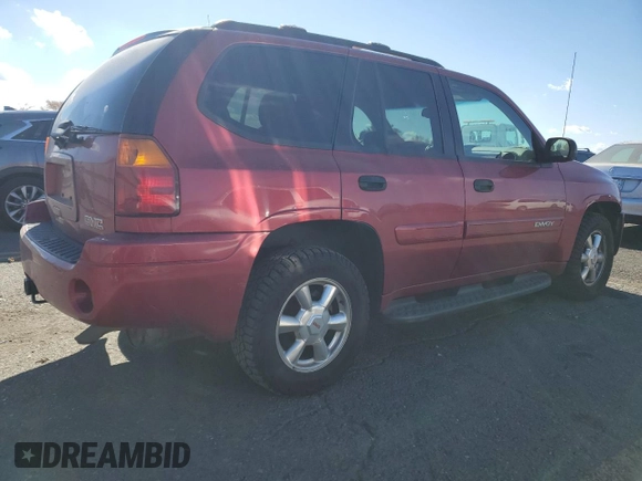 2004 GMC Envoy SLT with VIN 1GKDT13S542243359, listed as a Copart auction lot 79068994 with 199,062 mi miles and Salvage Title. Bid and sale history available at carsss.com. Image 3.