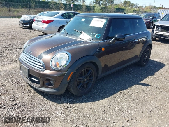 2012 MINI Hardtop with VIN WMWSU3C56CT257654, listed as a IAAI auction lot 42099156 with 84,384 mi miles and . Bid and sale history available at DreamBid. Image 2.