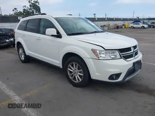 2015 Dodge Journey SXT with VIN 3C4PDDBG9FT606686, listed as a IAAI auction lot 42048201 with 107,593 mi miles and . Bid and sale history available at DreamBid. Image 1.