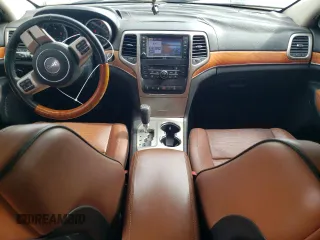 2013 Jeep Grand Cherokee Overland with VIN 1C4RJFCT2DC650336, listed as a Copart auction lot 55455105 with 129,858 mi miles and Clean Title. Bid and sale history available at carsss.com. Image 8.