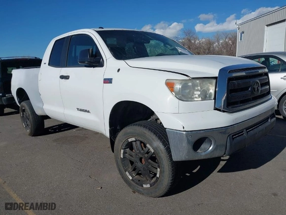 2010 Toyota Tundra 4WD Truck with VIN 5TFUW5F16AX102070, listed as a IAAI auction lot 41603206 with 214,742 mi miles. Bid and sale history available at carsss.com. Image 1.