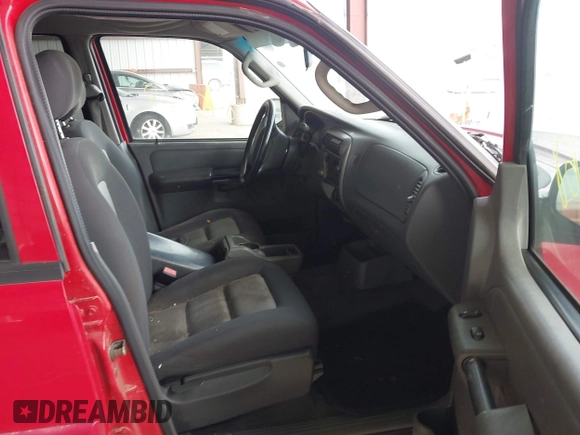 2005 Ford Explorer Sport Trac XLS z VIN 1FMZU67K75UA79569, wystawiony jako IAAI lot #41842068 z przebiegiem 212 991 mil mil oraz . Historia ofert i sprzedaży dostępna na DreamBid. Obrazek 5.