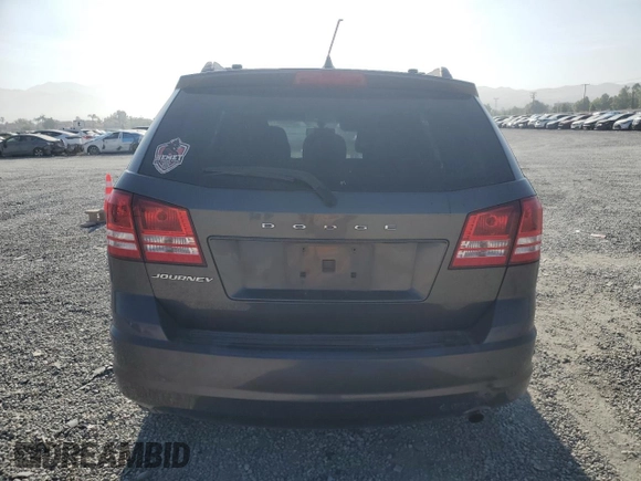 2014 Dodge Journey American Value with VIN 3C4PDCABXET277897, listed as a Copart auction lot 60566735 with 113,343 mi miles and Salvage title. Bid and sale history available at DreamBid. Image 6.