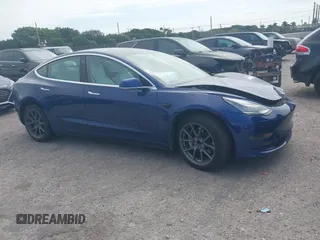 2020 Tesla Model 3 Standard Range Plus with VIN 5YJ3E1EA7LF785838, listed as a IAAI auction lot 41586081 with 38,392 mi miles and . Bid and sale history available at carsss.com. Image 1.