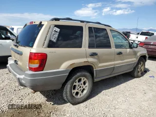2000 Jeep Grand Cherokee Laredo with VIN 1J4GW48S6YC304447, listed as a Copart auction lot 58001035 with Not provided miles and Clean title. Bid and sale history available at DreamBid. Image 3.