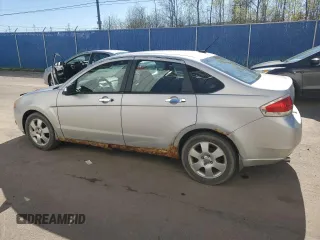 2009 Ford Focus SE z VIN 1FAHP35N29W126266, wystawiony jako Copart lot #56886465 z przebiegiem 420 672 mil mil oraz Czysty tytuł • Clean title. Historia ofert i sprzedaży dostępna na DreamBid. Obrazek 2.