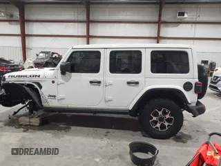 2021 Jeep Wrangler Unlimited Rubicon with VIN 1C4HJXFN2MW809904, listed as a IAAI auction lot 41567956 with 34,000 mi miles and . Bid and sale history available at DreamBid. Image 14.