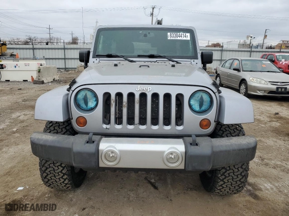 2013 Jeep Wrangler Unlimited Sahara with VIN 1C4BJWEG6DL594774, listed as a Copart auction lot 83304414 with 106,593 mi miles and Salvage Title. Bid and sale history available at carsss.com. Image 5.