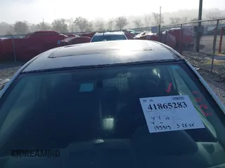 2009 Nissan Versa 1.8 SL with VIN 3N1BC13E09L421457, listed as a IAAI auction lot 41865283 with 195,313 mi miles. Bid and sale history available at carsss.com. Image 6.