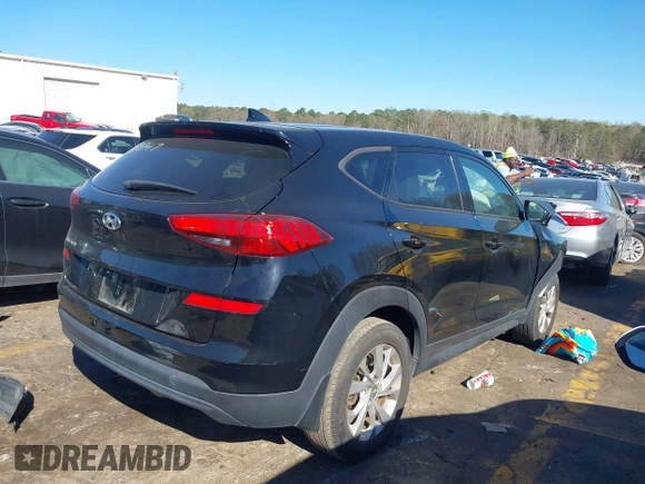 2021 Hyundai Tucson SE with VIN KM8J23A40MU334847, listed as a IAAI auction lot 41817556 with 63,000 mi miles and . Bid and sale history available at DreamBid. Image 4.