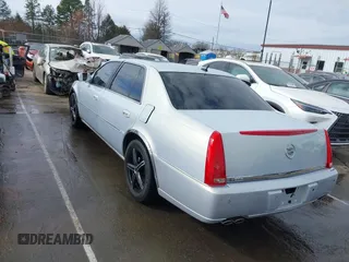 2006 Cadillac DTS w/1SC with VIN 1G6KD57Y56U101903, listed as a IAAI auction lot 41710160 with 151,057 mi miles. Bid and sale history available at carsss.com. Image 3.