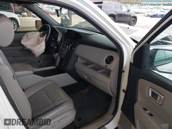 2014 Honda Pilot EX-L with VIN 5FNYF4H59EB047609, listed as a IAAI auction lot 42071353 with 148,661 mi miles and . Bid and sale history available at carsss.com. Image 5.
