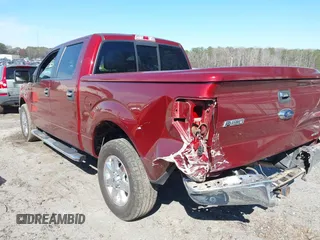 2014 Ford F-150 XL with VIN 1FTFW1CF2EKD08667, listed as a IAAI auction lot 41705412 with 129,817 mi miles. Bid and sale history available at carsss.com. Image 3.