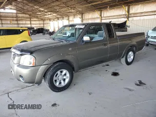2002 Nissan Frontier XE z VIN 1N6DD26S52C378601, wystawiony jako Copart lot #56782295 z przebiegiem 147 729 mil mil oraz Szkoda całkowita • Salvage title. Historia ofert i sprzedaży dostępna na DreamBid. Obrazek 1.