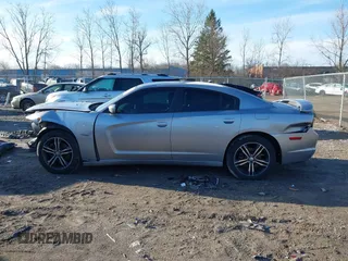 2014 Dodge Charger RT Plus with VIN 2C3CDXDT1EH124140, listed as a IAAI auction lot 41876248 with 127,399 mi miles. Bid and sale history available at carsss.com. Image 15.