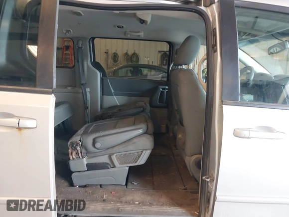 2010 Dodge Grand Caravan SE with VIN 2D4RN4DE8AR173359, listed as a IAAI auction lot 42170689 with 246,553 mi miles and . Bid and sale history available at DreamBid. Image 8.