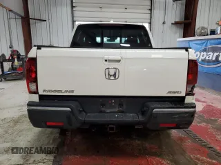 2017 Honda Ridgeline RTL-E with VIN 5FPYK3F72HB002890, listed as a Copart auction lot 57699735 with 128,813 mi miles and Salvage title. Bid and sale history available at DreamBid. Image 6.