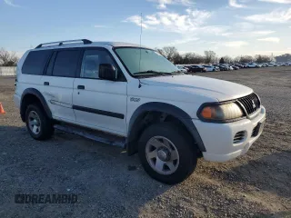 2004 Mitsubishi Montero Sport LS with VIN JA4MT21R44J001101, listed as a Copart auction lot 46726195 with 244,348 mi miles and Salvage Title. Bid and sale history available at carsss.com. Image 4.