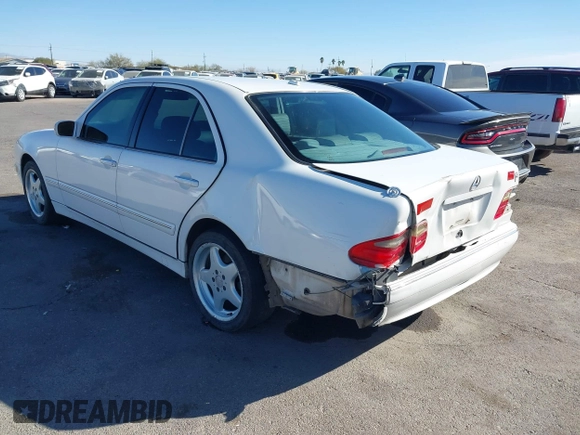 2002 Mercedes-Benz E-Class with VIN WDBJF82J62X076581, listed as a IAAI auction lot 41194976 with 235,453 mi miles. Bid and sale history available at carsss.com. Image 3.