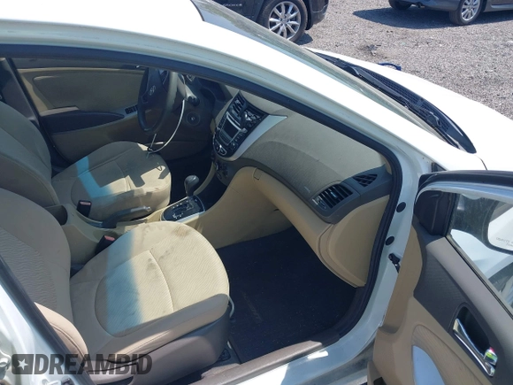 2014 Hyundai Accent GLS with VIN KMHCU4AE8EU589409, listed as a IAAI auction lot 42171087 with 209,204 mi miles. Bid and sale history available at carsss.com. Image 5.