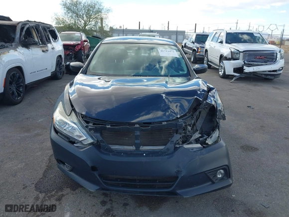 2017 Nissan Altima 2.5 SV with VIN 1N4AL3APXHC172982, listed as a IAAI auction lot 41733473 with 118,738 mi miles. Bid and sale history available at carsss.com. Image 13.