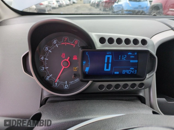 2012 Chevrolet Sonic LT z VIN 1G1JD5SH2C4164834, wystawiony jako Copart lot #53425665 z przebiegiem 89 043 mil mil oraz Szkoda całkowita • Salvage title. Historia ofert i sprzedaży dostępna na DreamBid. Obrazek 9.