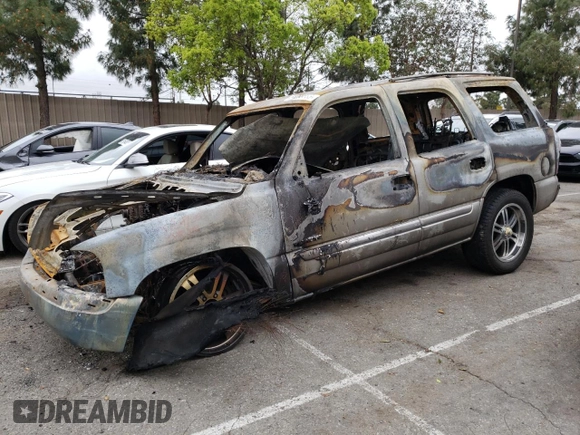 2005 GMC Yukon SLT z VIN 1GKEC13T25J236664, wystawiony jako Copart lot #51298885 z przebiegiem Nie podano mil oraz Nie do naprawy • Non repairable. Historia ofert i sprzedaży dostępna na DreamBid. Obrazek 1.
