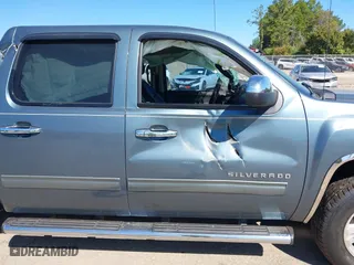 2010 Chevrolet Silverado 1500 LT with VIN 3GCRCSE09AG151287, listed as a IAAI auction lot 40532023 with 154,535 mi miles. Bid and sale history available at carsss.com. Image 14.