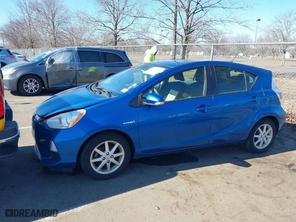 2014 Toyota Prius c One with VIN JTDKDTB30E1574346, listed as a IAAI auction lot 41756182 with 187,631 mi miles. Bid and sale history available at carsss.com. Image 6.
