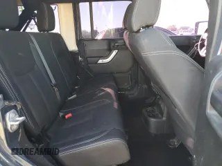 2018 Jeep Wrangler JK Unlimited Rubicon with VIN 1C4BJWFG9JL840582, listed as a Copart auction lot 73064054 with 47,590 mi miles and Salvage Title. Bid and sale history available at carsss.com. Image 11.