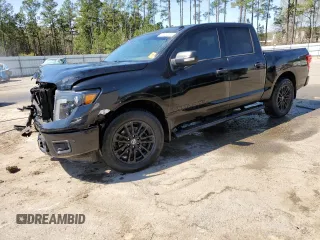 2018 Nissan Titan SV with VIN 1N6AA1E61JN520777, listed as a Copart auction lot 50312605 with 62,122 mi miles and Salvage Title. Bid and sale history available at DreamBid. Image 1.