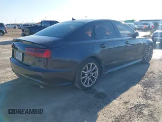 2016 Audi A6 2.0T Premium with VIN WAUFFAFC5GN199203, listed as a IAAI auction lot 41150658 with 181,176 mi miles. Bid and sale history available at carsss.com. Image 4.