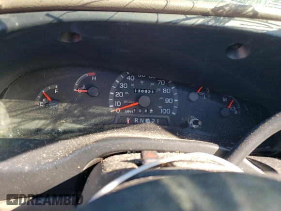 1999 Ford Econoline Passenger XL with VIN 1FBSS31L0XHB12679, listed as a Copart auction lot 74257504 with 136,821 mi miles and Salvage Title. Bid and sale history available at DreamBid. Image 9.