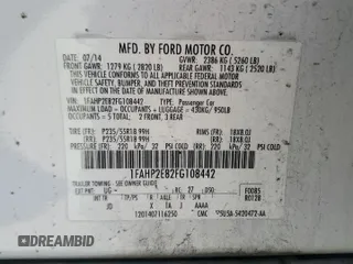 2015 Ford Taurus SEL z VIN 1FAHP2E82FG108442, wystawiony jako Copart lot #57790515 z przebiegiem 116 834 mil mil oraz Szkoda całkowita • Salvage title. Historia ofert i sprzedaży dostępna na DreamBid. Obrazek 12.