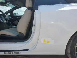 2016 Buick Cascada Premium с VIN W04WT3N57GG152036, выставлен на аукционе Copart как лот 67237824 с пробегом 70 623 миль миль и Списание • Salvage title. История ставок и продаж доступна на DreamBid. Изображение 12.