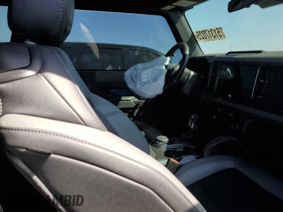 2024 Ford Bronco Big Bend z VIN 1FMDE7AH9RLA94869, wystawiony jako Copart lot #51317025 z przebiegiem 6 884 mil mil oraz Szkoda całkowita • Salvage title. Historia ofert i sprzedaży dostępna na DreamBid. Obrazek 10.
