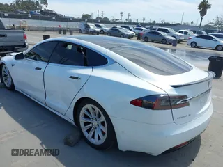 2018 Tesla Model S 75D with VIN 5YJSA1E25JF245269, listed as a IAAI auction lot 41914567 with 56,086 mi miles and . Bid and sale history available at DreamBid. Image 3.