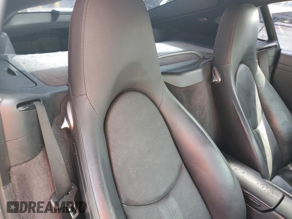 2008 Porsche 718 Cayman z VIN WP0AA29808U762285, wystawiony jako Copart lot #70383324 z przebiegiem Nie podano mil oraz Nie do naprawy • Non repairable. Historia ofert i sprzedaży dostępna na DreamBid. Obrazek 10.