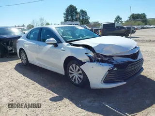 2021 Toyota Camry Hybrid LE with VIN 4T1C31AK2MU027513, listed as a IAAI auction lot 41856681 with 85,779 mi miles. Bid and sale history available at carsss.com. Image 1.