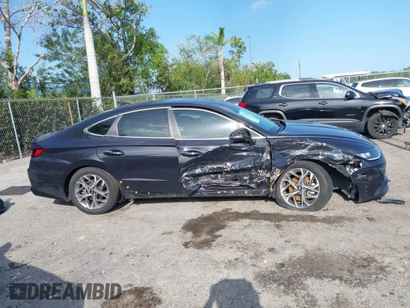 2023 Hyundai Sonata SEL z VIN KMHL64JA0PA289889, wystawiony jako IAAI lot #41931833 z przebiegiem 24 070 mil mil oraz . Historia ofert i sprzedaży dostępna na DreamBid. Obrazek 13.