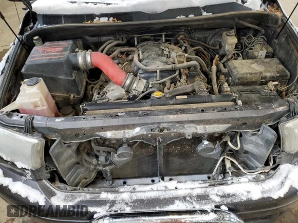 2013 Toyota Tundra z VIN 5TFDY5F18DX271506, wystawiony jako Copart lot #82296664 z przebiegiem Nie podano mil oraz Szkoda całkowita • Salvage title. Historia ofert i sprzedaży dostępna na DreamBid. Obrazek 11.